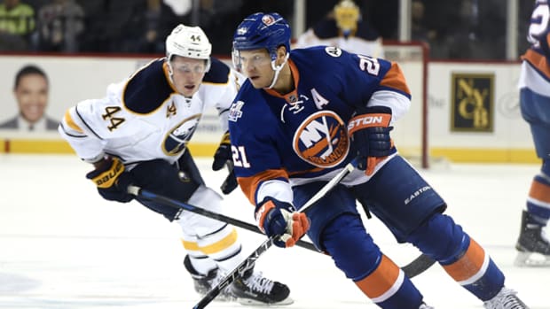 Islanders Star Kyle Okposo Helps Launch New Toy Rinks