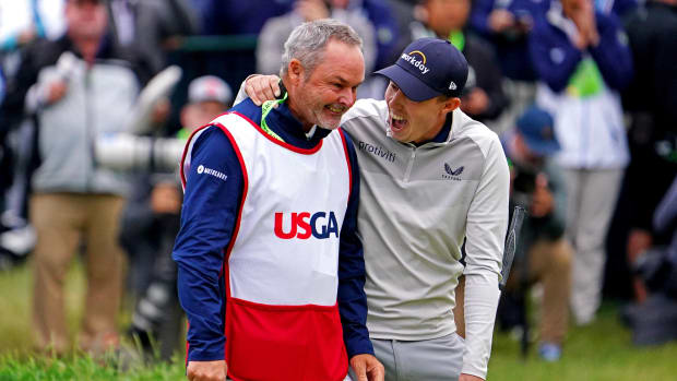 Caddie Billy Foster and golfer Matthew Fitzpatrick celebrate winning the U.S. Open