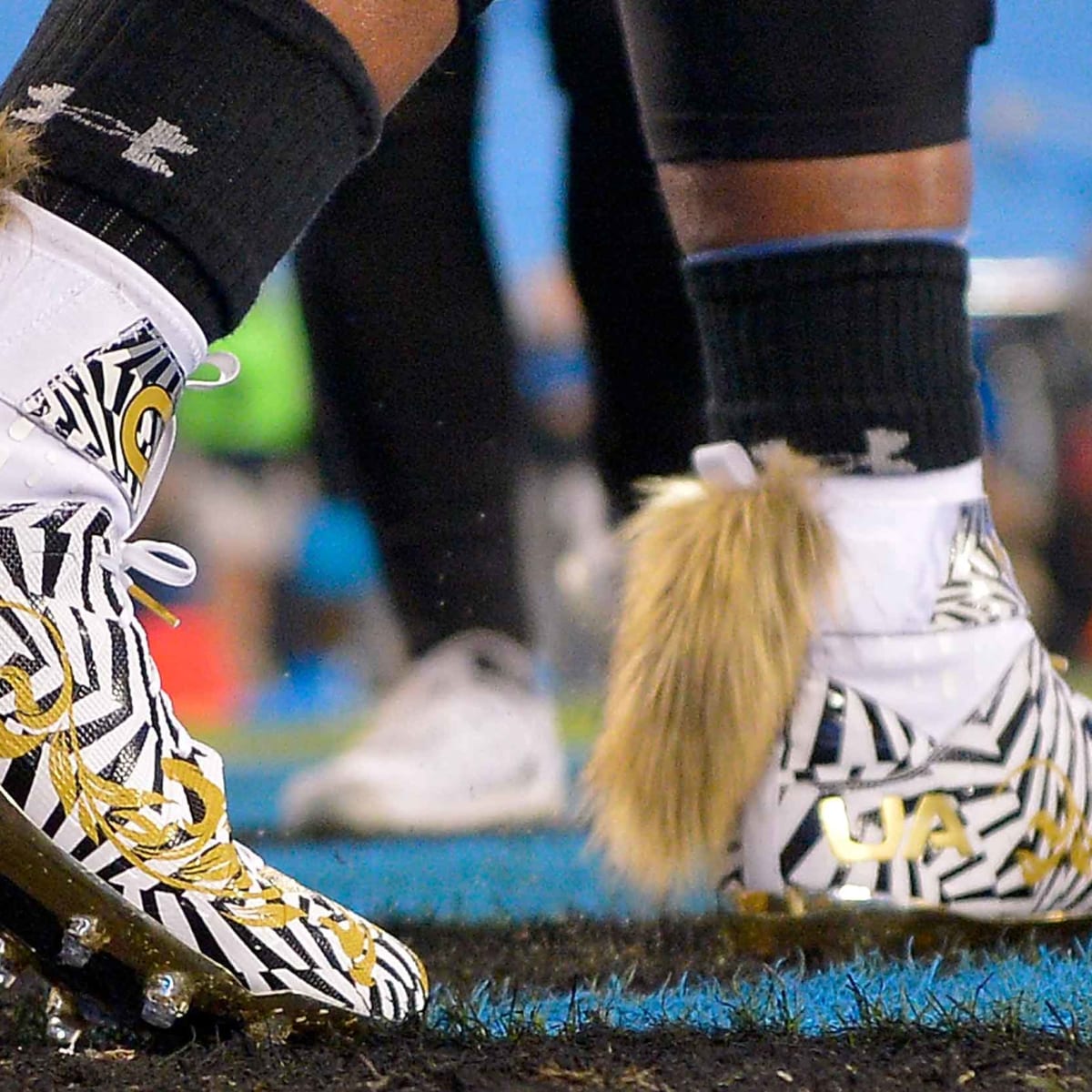 Black and yellow cam deals newton cleats
