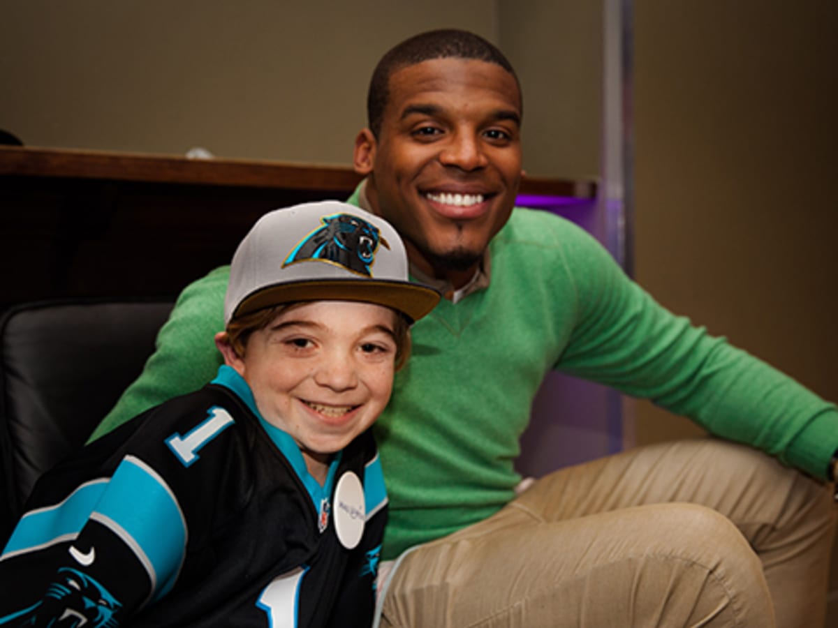 Cam Newton Makes 11 Year Old Fan s Wish Come True SI Kids