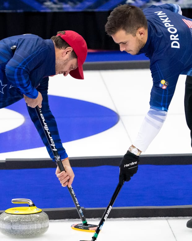 Nov 21, 2021; Omaha, Nebraska, USA; John Shuster (left) and Korey Dropkin compete during U.S. Olympic Team Trials for Curling at Baxter Arena.