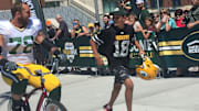 The Green Bay Packers Share a Fun Two-Wheel Tradition With Their Young Fans