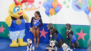 Simone Biles Has New Canine Co-Stars