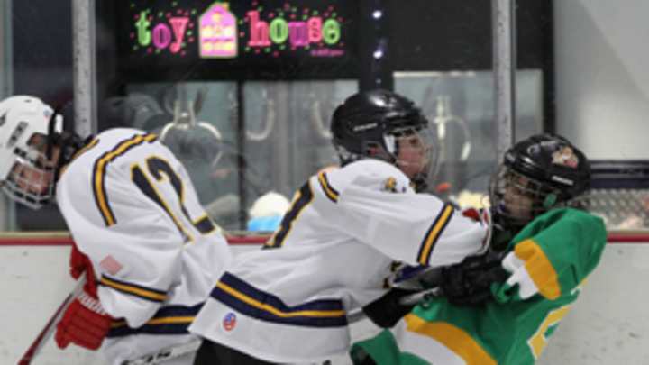 Hockey Canada bans checking in peewee division Hockey Canada bans checking in peewee division