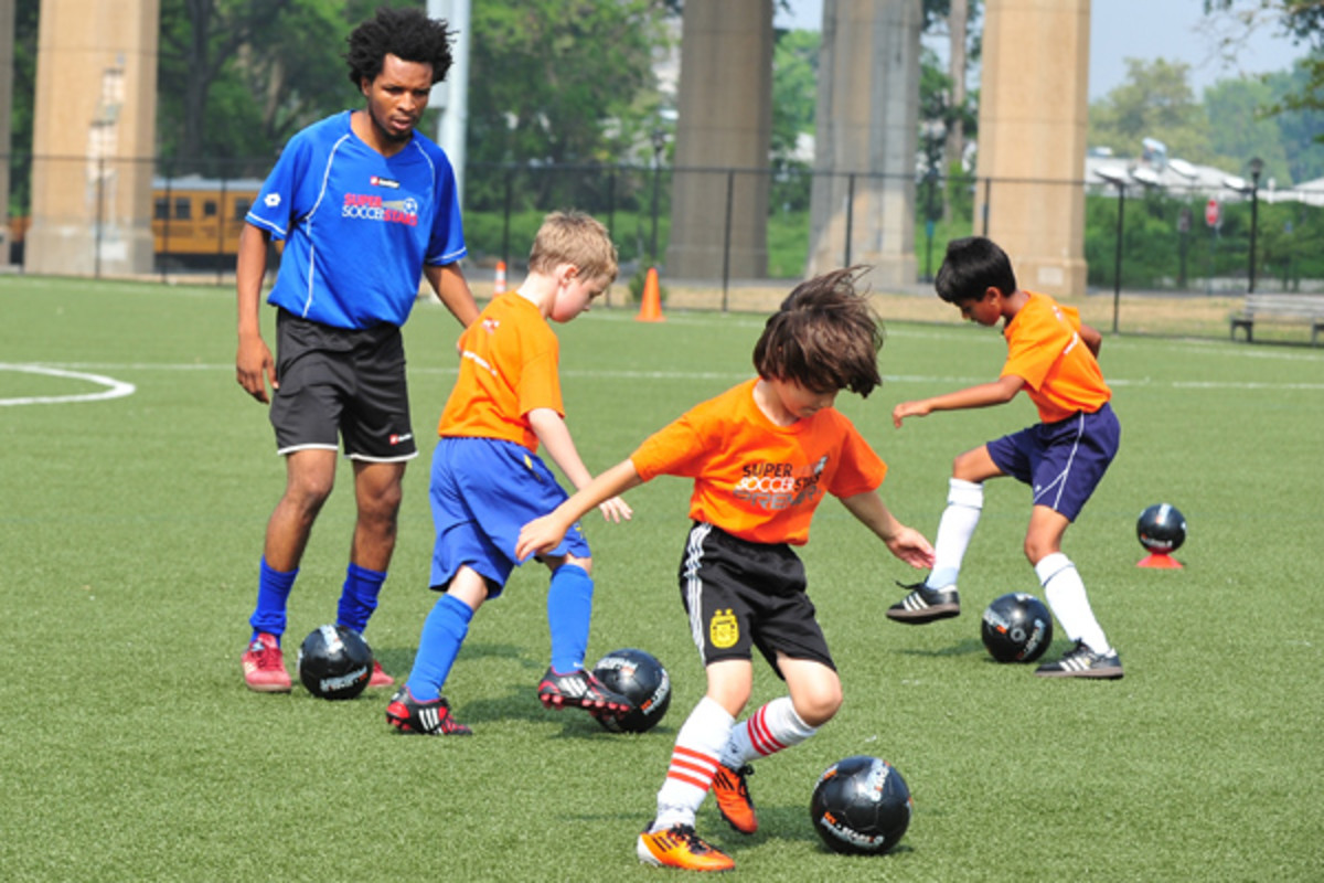 Kids Learn From Pros at Soccer Camp SI Kids Sports News for Kids