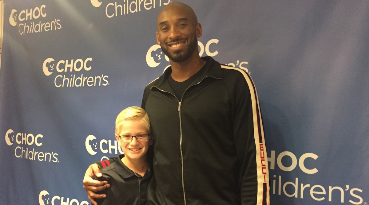 Kid Reporter Carlo Vellandi and Kobe Bryant.