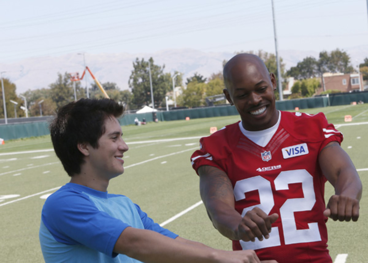 billy unger with carlos rogers of the 49ers