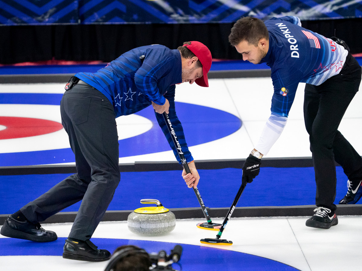 Nov 21, 2021; Omaha, Nebraska, USA; John Shuster (left) and Korey Dropkin compete during U.S. Olympic Team Trials for Curling at Baxter Arena.