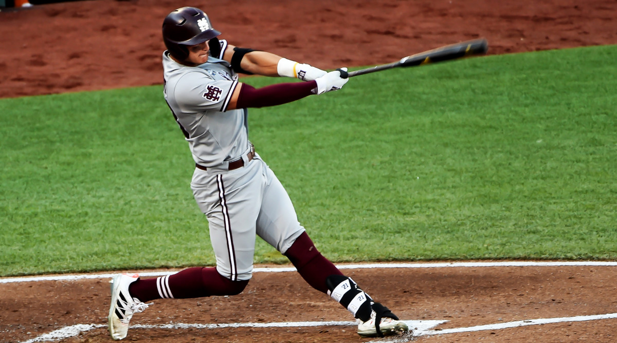 Jun 20, 2021; Omaha, Nebraska, USA; Mississippi State Bulldogs outfielder Brad Cumbest (33) drives in a run with a triple against the Texas Longhorns in the fourth inning at TD Ameritrade Park.