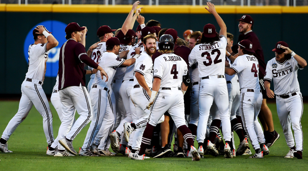 Jun 26, 2021; Omaha, Nebraska, USA; Tje Mississippi State Bulldogs celebrate the win against the Texas Longhorns at TD Ameritrade Park.