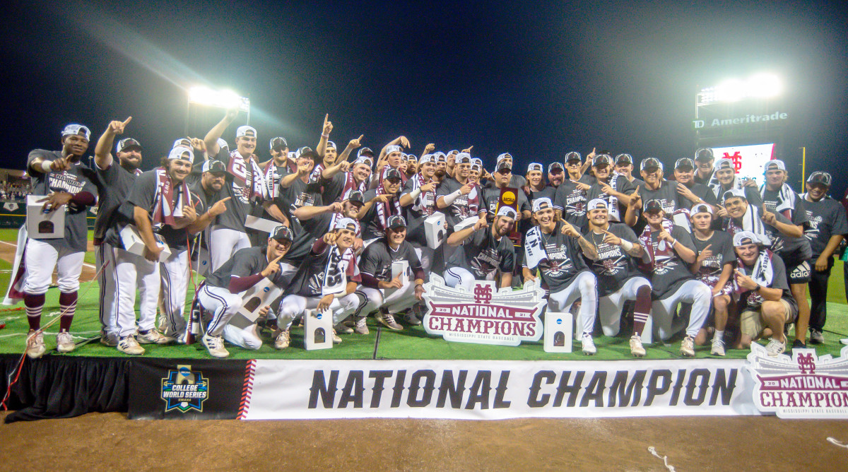 Jun 30, 2021; Omaha, Nebraska, USA;  The Mississippi St. Bulldogs pose for a team photo after winning the national championship against the Vanderbilt Commodores at TD Ameritrade Park.