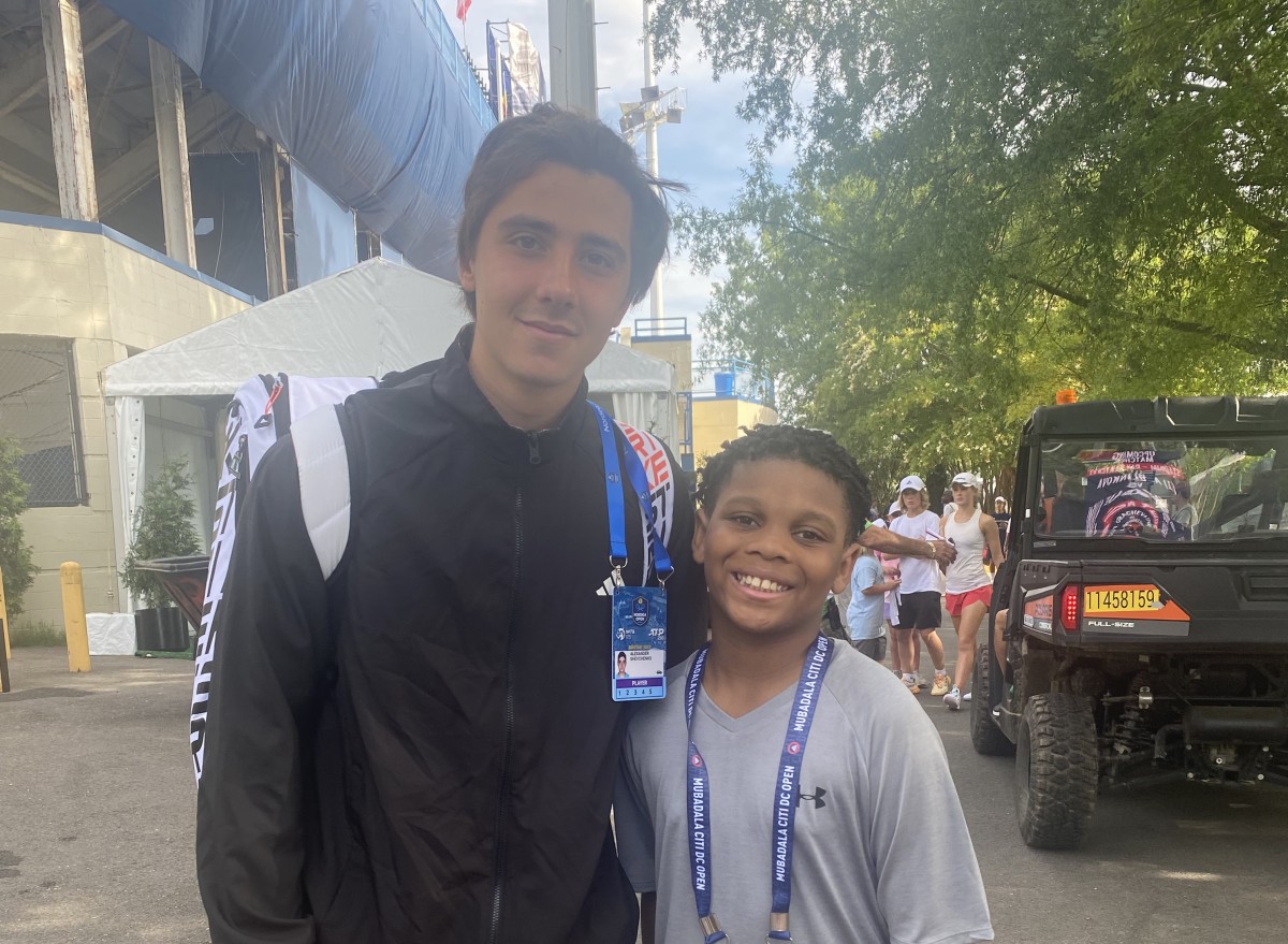 Kid Reporter Xander Dorsey with Russian tennis player Alexander Shevchenko