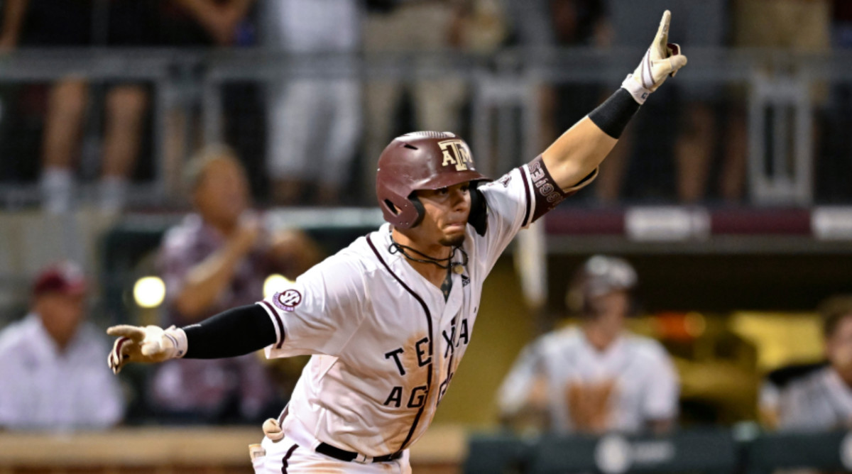 Texas A&M catcher Troy Claunch (12) reacts after hitting a walk-off RBI single in the ninth against Louisville in game one of the super regional